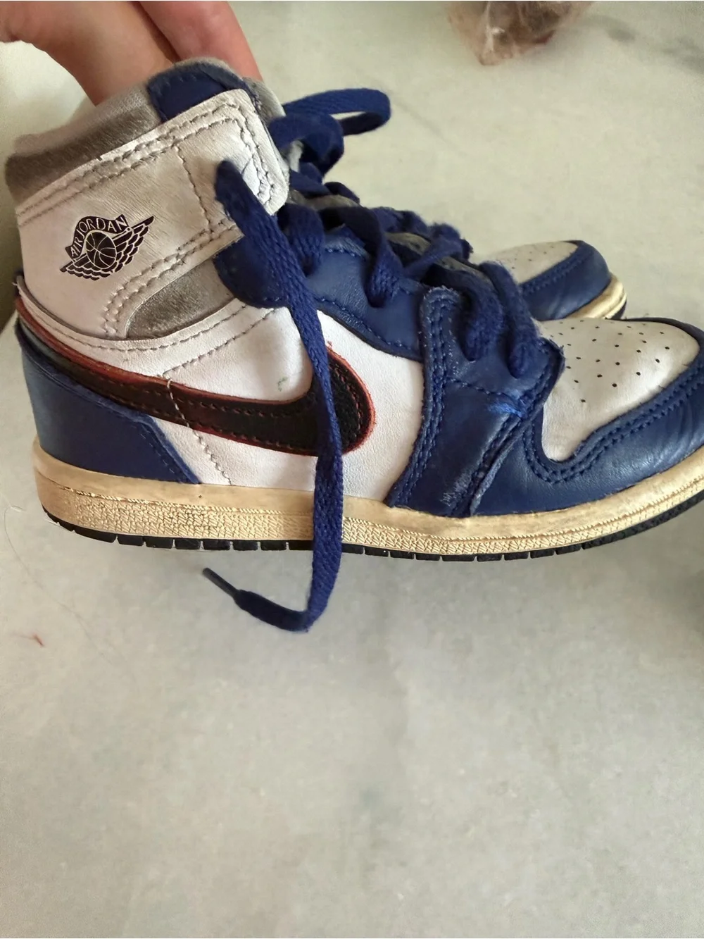 Nike Kids White and Blue High-Top Sneakers with Black Swoosh